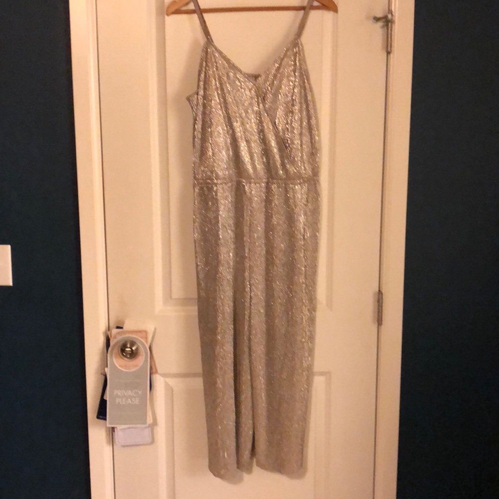 Gold metallic spaghetti strap jumpsuit.